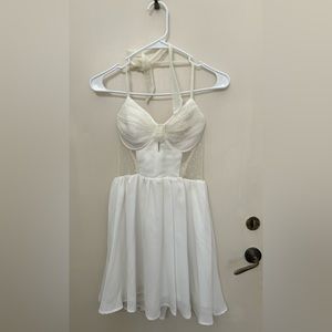 White halter skater dress with mesh swiss dot detail